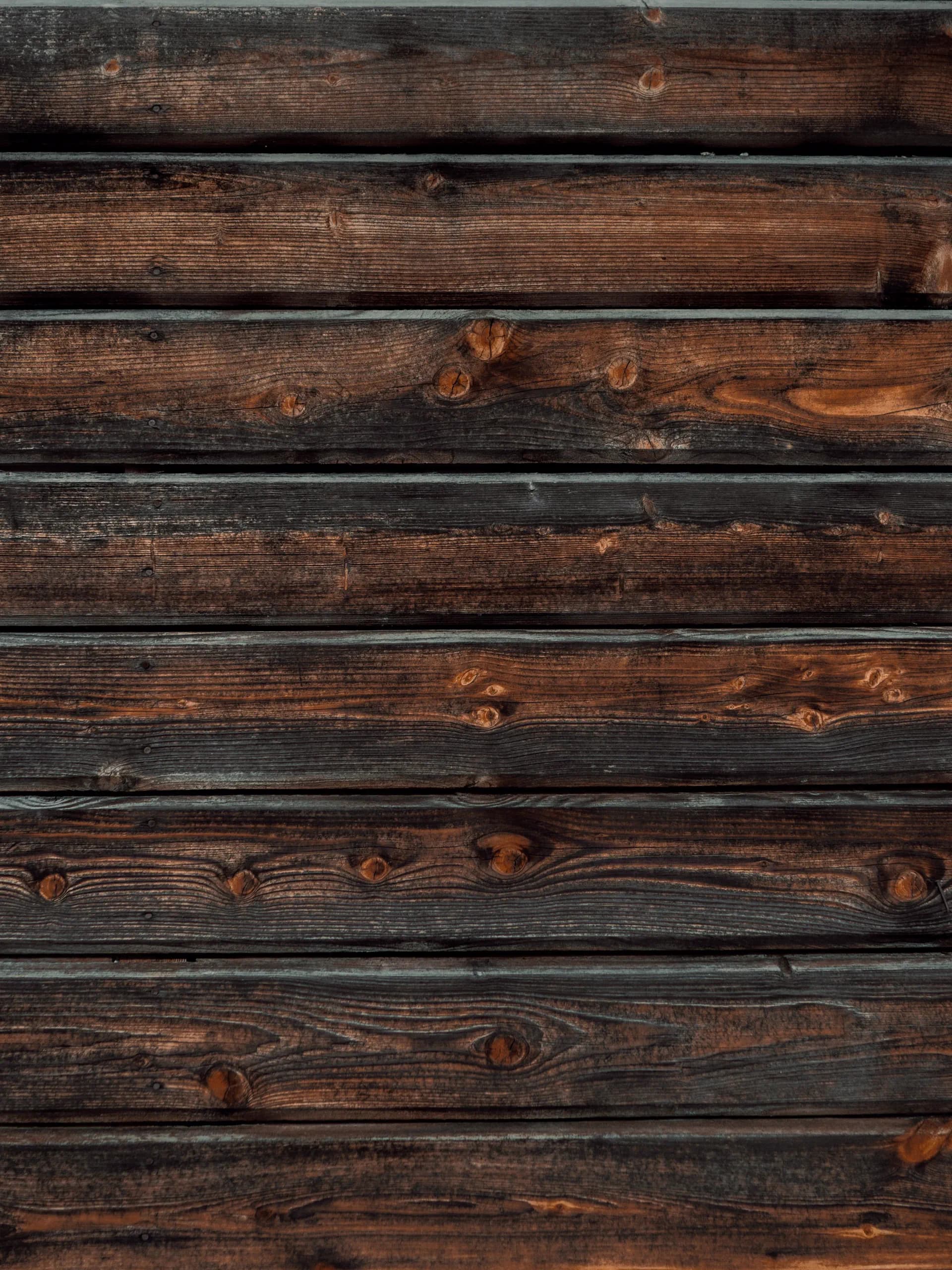 Close-up of warm, richly grained teak wood planks
